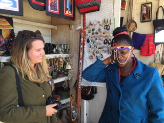 Volunteer Agatha shopping for souvenirs to bring back